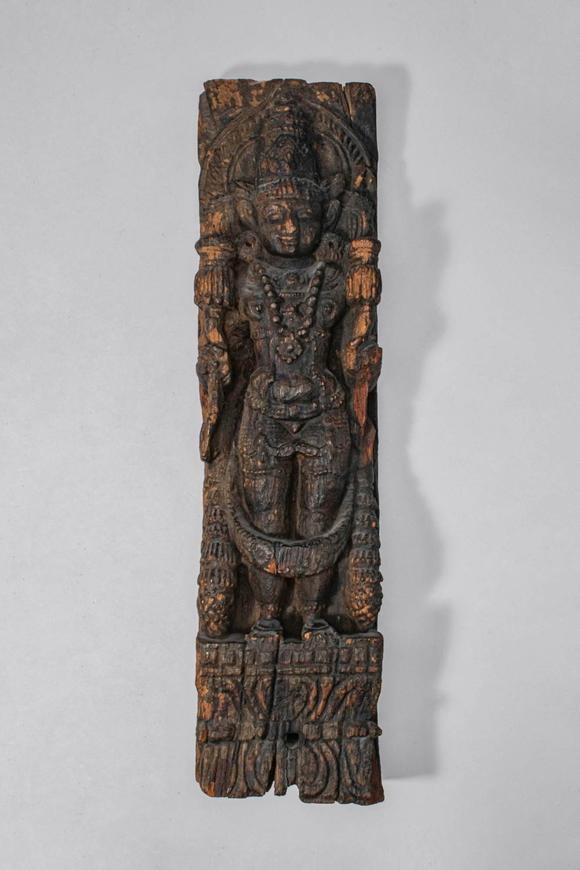 Apollo Art AuctionsCa. 18th-19th century AD.
A carved pair of wooden architectural panels, each depicting a Hindu de