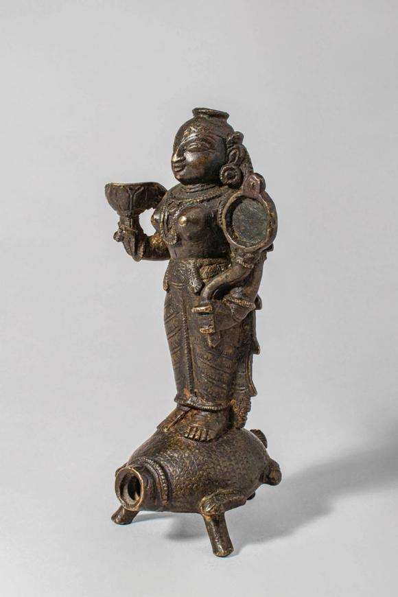 Apollo Art AuctionsCa. 14th-15th century AD. A bronze oil lamp cast in the form of Goddess Lakshmi, the consort of V