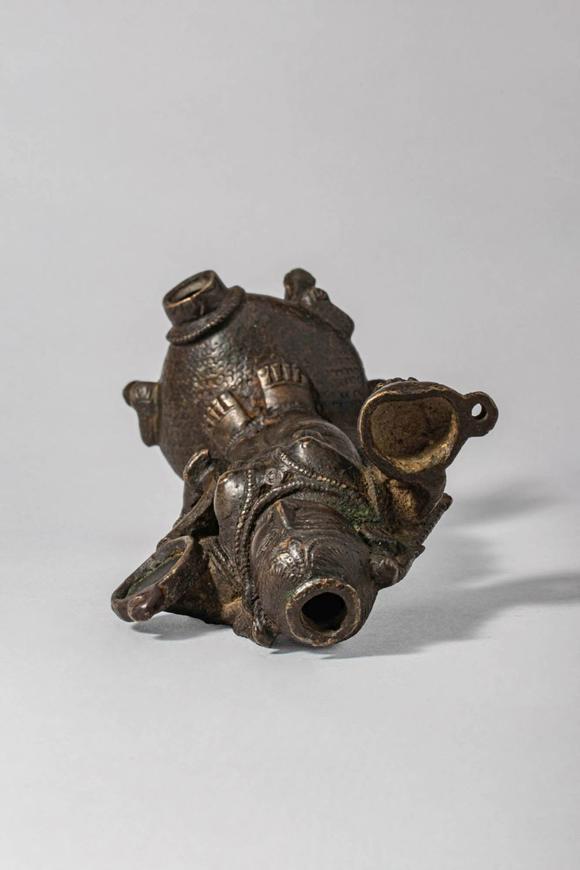 Apollo Art AuctionsCa. 14th-15th century AD. A bronze oil lamp cast in the form of Goddess Lakshmi, the consort of V