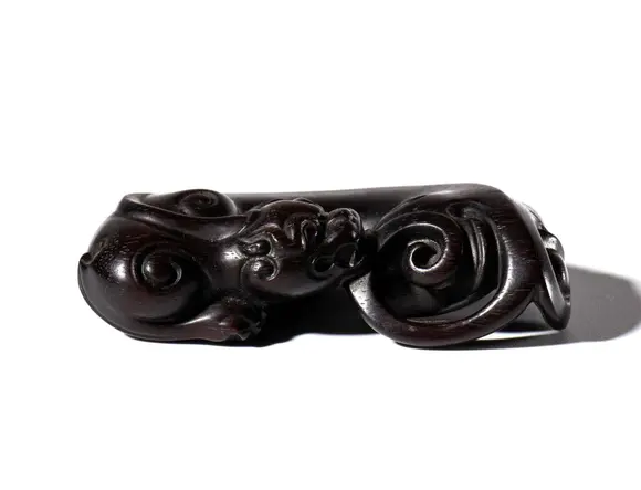 Bertolami Fine ArtA dragon figurine carved from sandalwood. China, 20th century.
