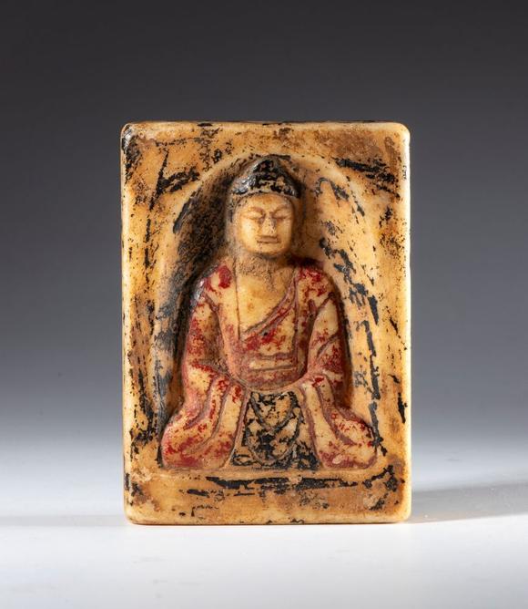 Bertolami Fine ArtWhite marble relief with traces of polychromy depicting Buddha in meditation. China, 19th century.