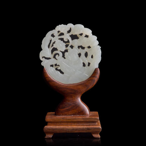 Oakridge Auction Gallery十九世紀(jì)早 白玉鏤雕童子佩（附木座）  A Chinese reticulated white jade 'boy' plaque