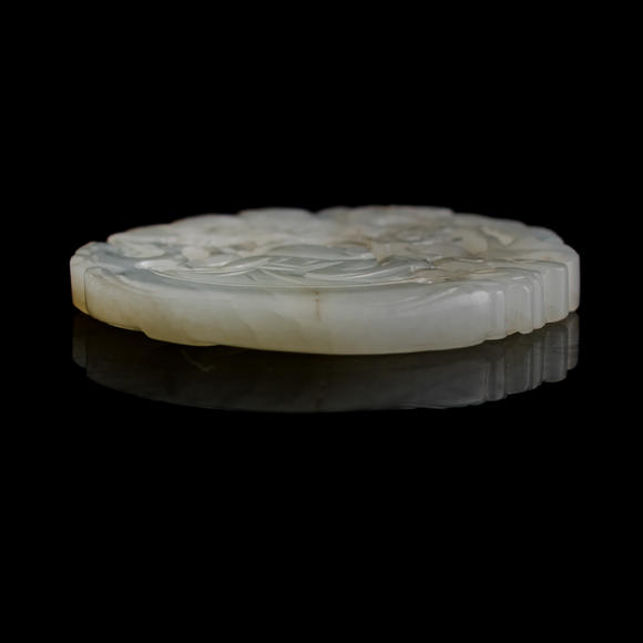 Oakridge Auction Gallery十九世紀(jì)早 白玉鏤雕童子佩（附木座）  A Chinese reticulated white jade 'boy' plaque