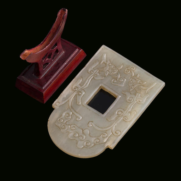Oakridge Auction Gallery十九世紀 白玉雕螭龍紋斧形佩（附木架）  A Chinese carved white jade 'chilong' axe-form plaque