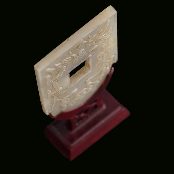 Oakridge Auction Gallery十九世紀 白玉雕螭龍紋斧形佩（附木架）  A Chinese carved white jade 'chilong' axe-form plaque