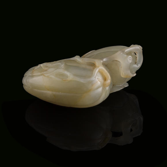 Oakridge Auction Gallery十八世紀 玉瓜把件  A Chinese melon-form jade ornament