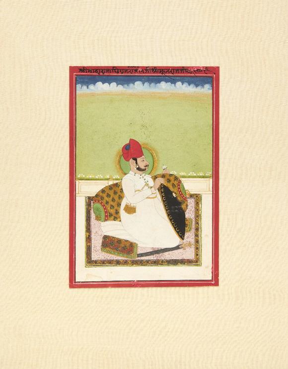 RoseberysA seated portrait of a ruler,?
Jodhpur, Rajasthan, North India, early 19th century,?

Opaque pigments on paper heightened with gold, possibly Mah