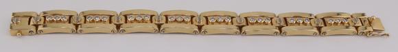Clarke Auction GalleryJEWELRY. Men's 14kt Gold and Diamond Bracelet.