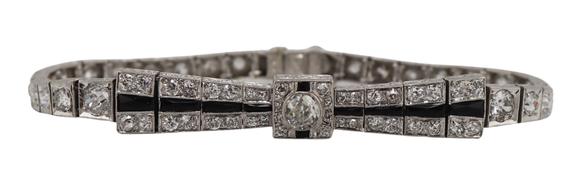 Clarke Auction GalleryJEWELRY. Art Deco Platinum, Diamond and Onyx