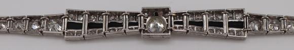 Clarke Auction GalleryJEWELRY. Art Deco Platinum, Diamond and Onyx