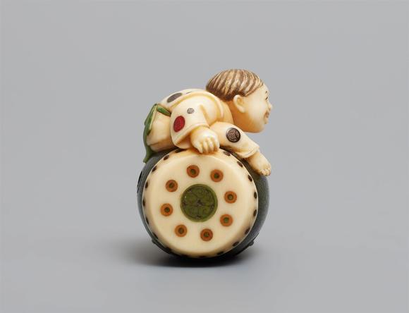 Kunsthaus Lempertz KGA partly stained netsuke of a boy by Kodama Yoshiaki. Late 19th century