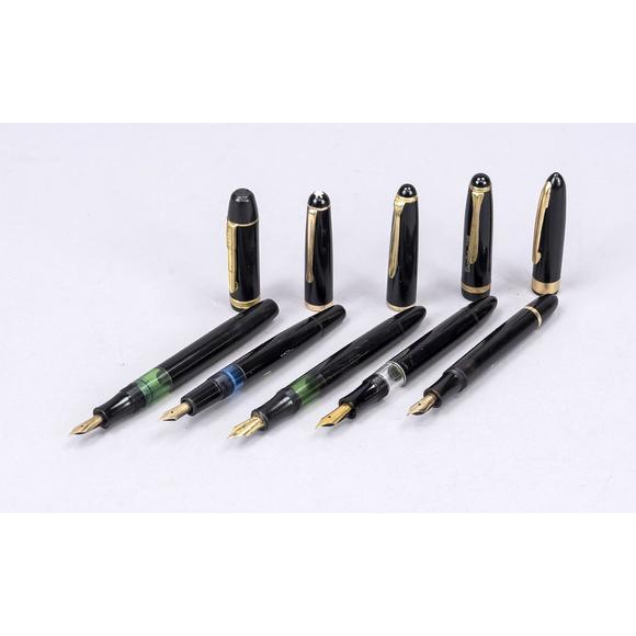 Historia Auktionshaus5 fountain pen holders, 20th centur