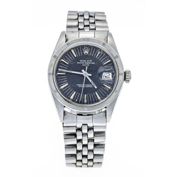 Historia AuktionshausRolex Oyster Perpetual Date, superl