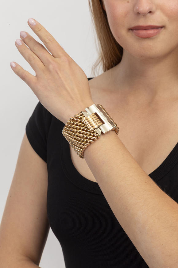 Piguet - H?tel des VentesLarge bracelet années 1940-50 2 ors 750 à maille souple