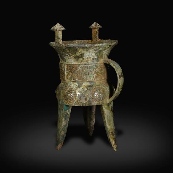KARSON AUCTIONShang Dynasty Bronze jia ritual vessel with taotie patterns