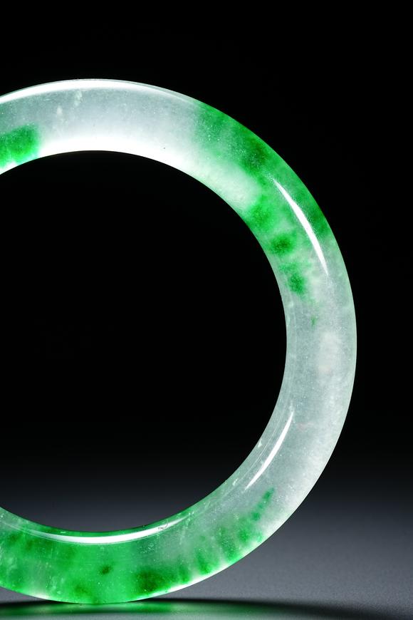 HUNG YUN ZHAI AUCTION HOUSE INCJadeite and Gemstone Bangles