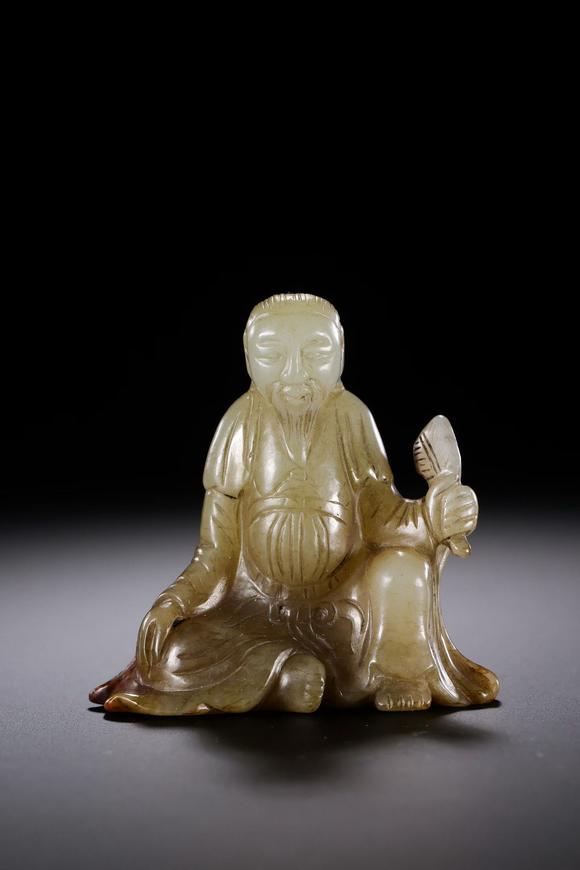 HUNG YUN ZHAI AUCTION HOUSE INCHetian Jade Seated Scholar Figure