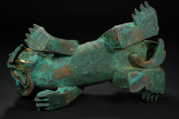HUNG YUN ZHAI AUCTION HOUSE INCPre-Ming Dynasty Gold and Silver Inlaid Inscribed Mythical Beast