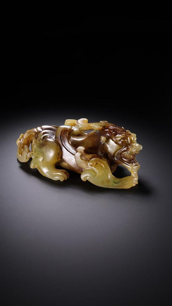HUNG YUN ZHAI AUCTION HOUSE INCPre-Ming Dynasty Hetian Jade Auspicious Beast