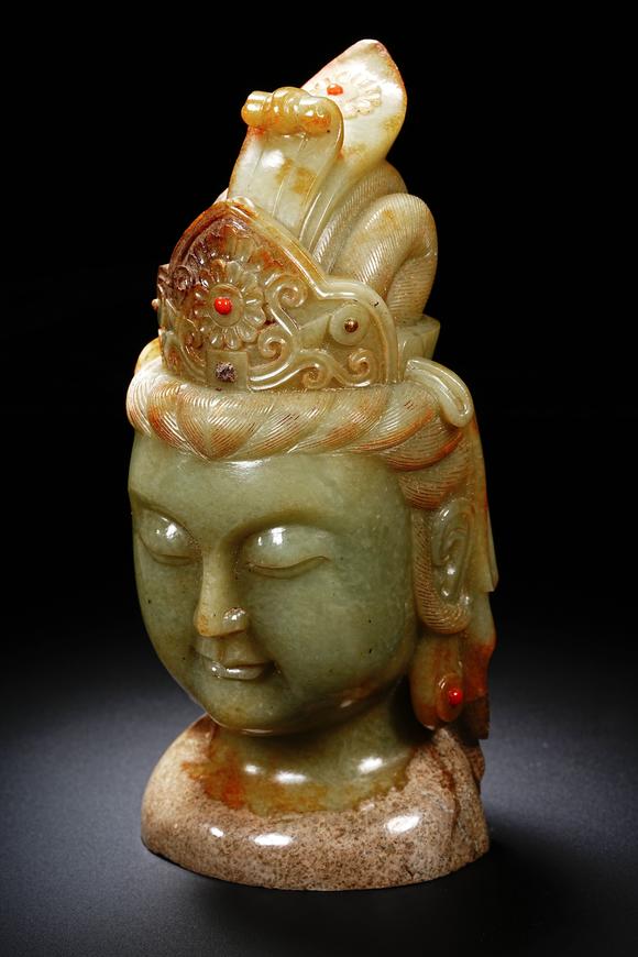 HUNG YUN ZHAI AUCTION HOUSE INCPre-Ming Dynasty Hetian Jade Guanyin Head