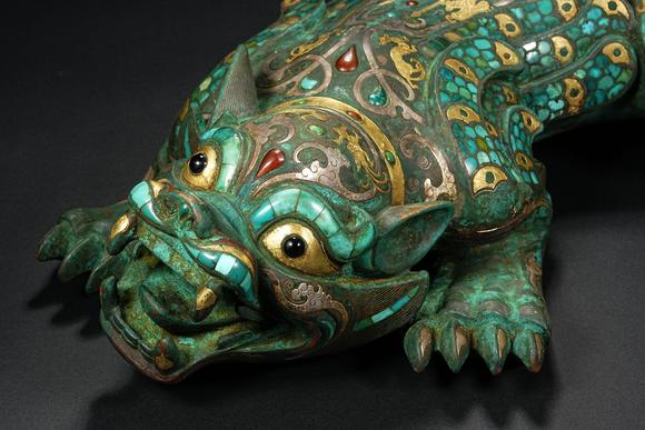 HUNG YUN ZHAI AUCTION HOUSE INCPre-Ming Dynasty Gold and Silver Inlaid Inscribed Mythical Beast