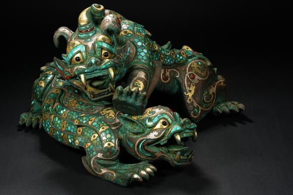 HUNG YUN ZHAI AUCTION HOUSE INCPre-Ming Dynasty Gold and Silver Inlaid Inscribed Mythical Beast