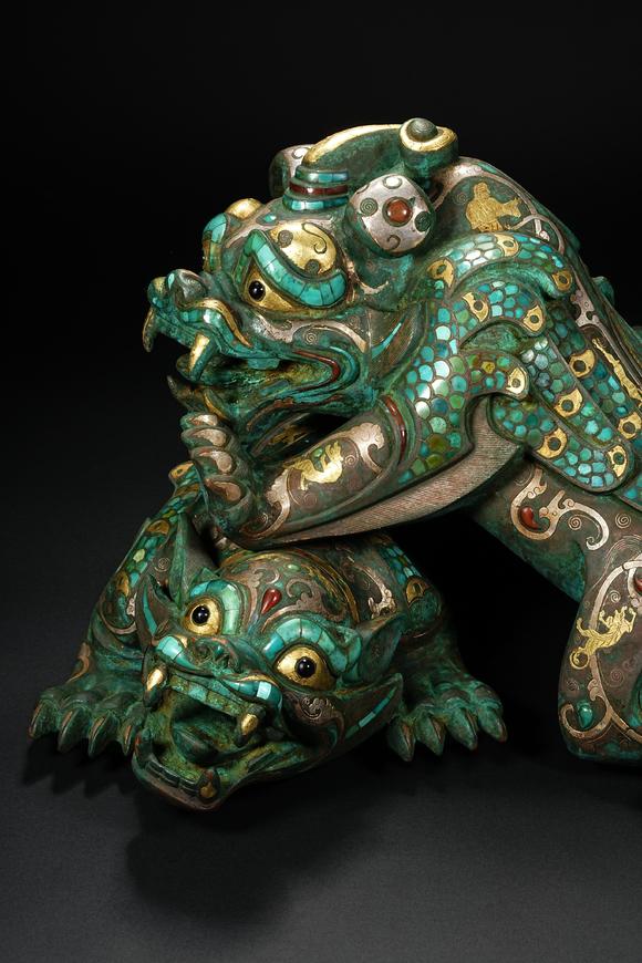 HUNG YUN ZHAI AUCTION HOUSE INCPre-Ming Dynasty Gold and Silver Inlaid Inscribed Mythical Beast