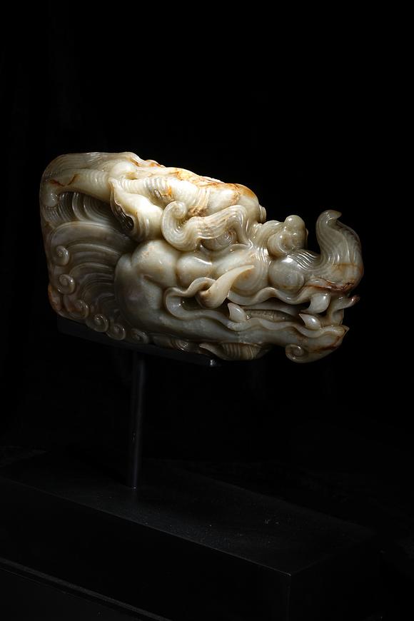 HUNG YUN ZHAI AUCTION HOUSE INCPre-Ming Dynasty or Earlier Hetian Jade Dragon-Head Ornament