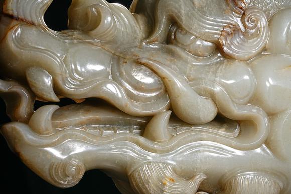 HUNG YUN ZHAI AUCTION HOUSE INCPre-Ming Dynasty or Earlier Hetian Jade Dragon-Head Ornament