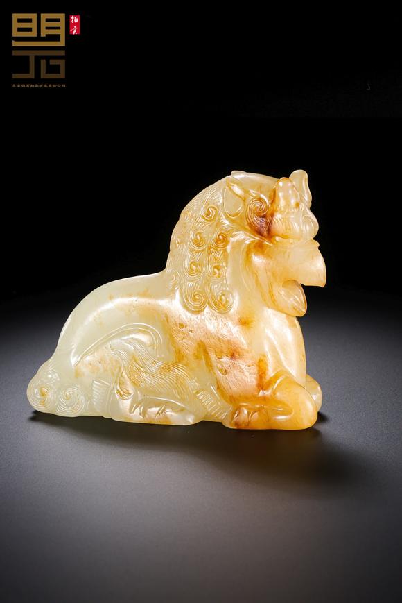 北京明石拍賣有限公司明 白玉紅沁獅鷲神獸