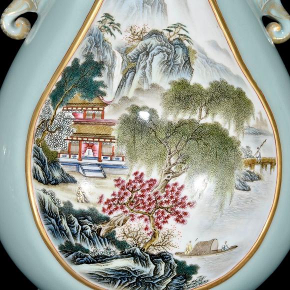 北京唐潮拍賣有限公司青釉粉彩山水亭臺(tái)樓閣紋象耳尊