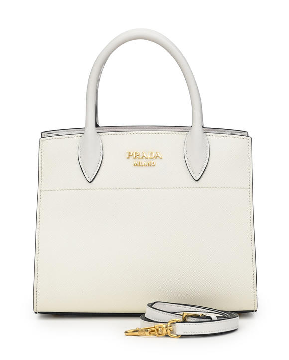 Piguet - H?tel des VentesPrada, sac City mini Bibliothèque en cuir saffiano blanc avec soufflet rose, bandoulière