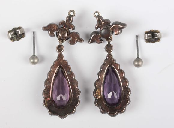 TooveysA pair of gold backed and silver set, diamond and amethyst drop shap