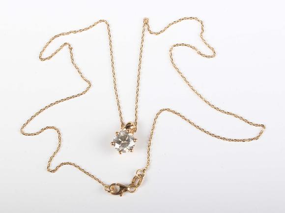 TooveysAn 18ct gold and diamond single stone pendant, claw set with a circu