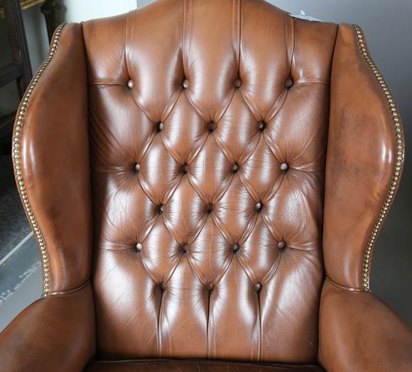 TooveysA pair of late 20th century George III style wing back armchairs, up