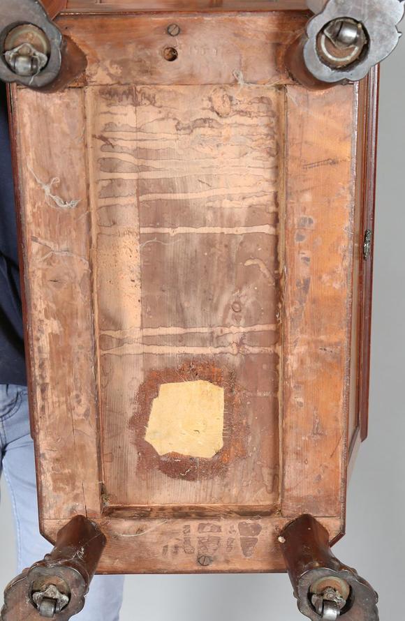 TooveysA George IV mahogany wine cooler of panelled sarcophagus form, the s