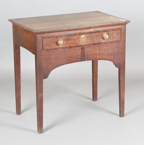 TooveysA George III provincial oak side table, probably North Country, the