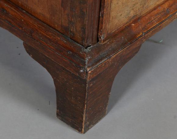 TooveysA George I walnut chest of oak-lined drawers with feather banded bor