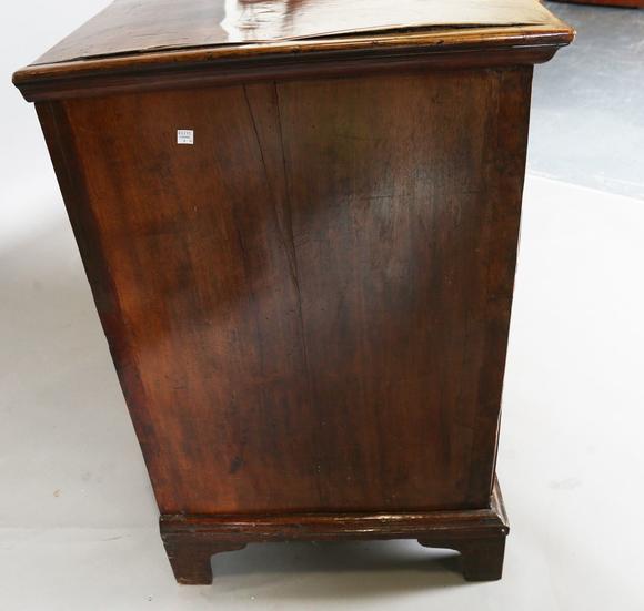 TooveysA George I walnut chest of oak-lined drawers with feather banded bor