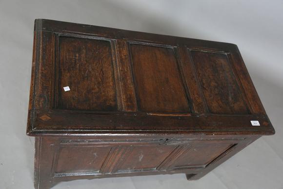TooveysAn early 18th century provincial oak panelled coffer with incised de
