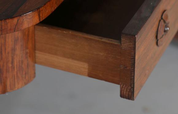 TooveysAn early Victorian rosewood centre table, fitted with two frieze dra