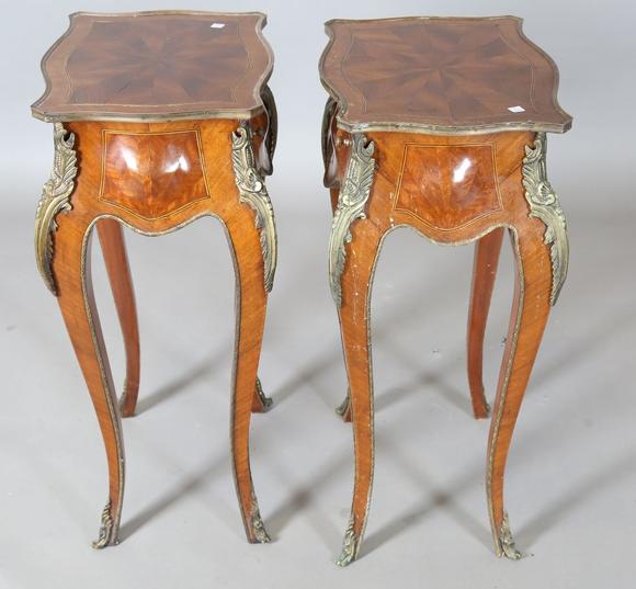 TooveysA pair of 20th century French mahogany bedside tables of shaped bomb
