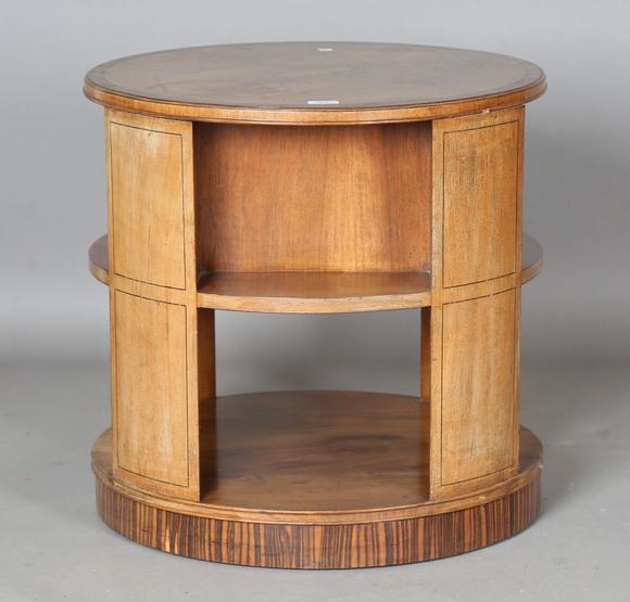 TooveysAn Art Deco walnut revolving book table by Heal & Son Ltd, the quart