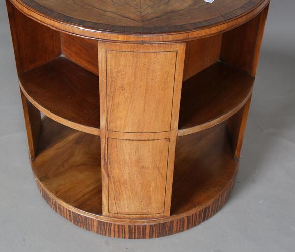 TooveysAn Art Deco walnut revolving book table by Heal & Son Ltd, the quart