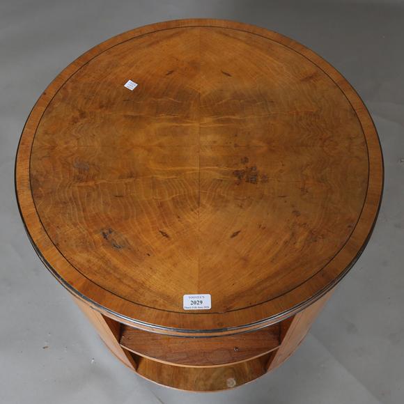 TooveysAn Art Deco walnut revolving book table by Heal & Son Ltd, the quart
