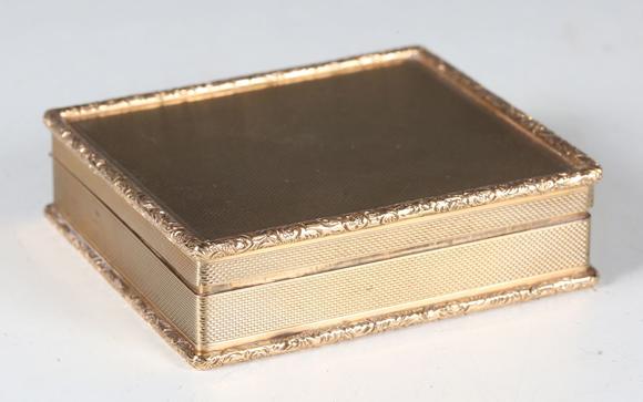 TooveysA mid-20th century 9ct gold rectangular box with overall machine eng