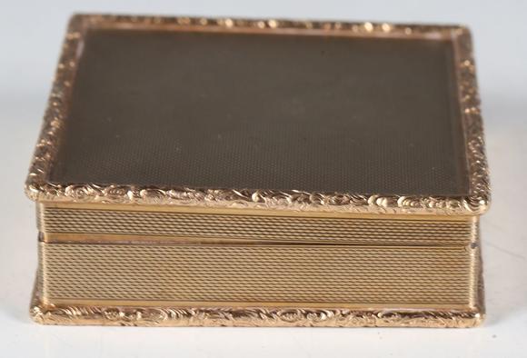 TooveysA mid-20th century 9ct gold rectangular box with overall machine eng
