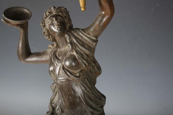 TooveysA late 19th century cast spelter figural table lamp in the form of a