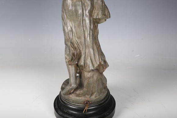TooveysA late 19th century cast spelter figural table lamp in the form of a