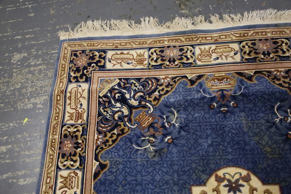 TooveysA Chinese carpet, late 20th century, the blue field with a floral me